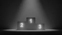 A podium with empty steps from left to right labeled 2, 1 and 3. The 1st place is highest and the 3rd place is lowest.