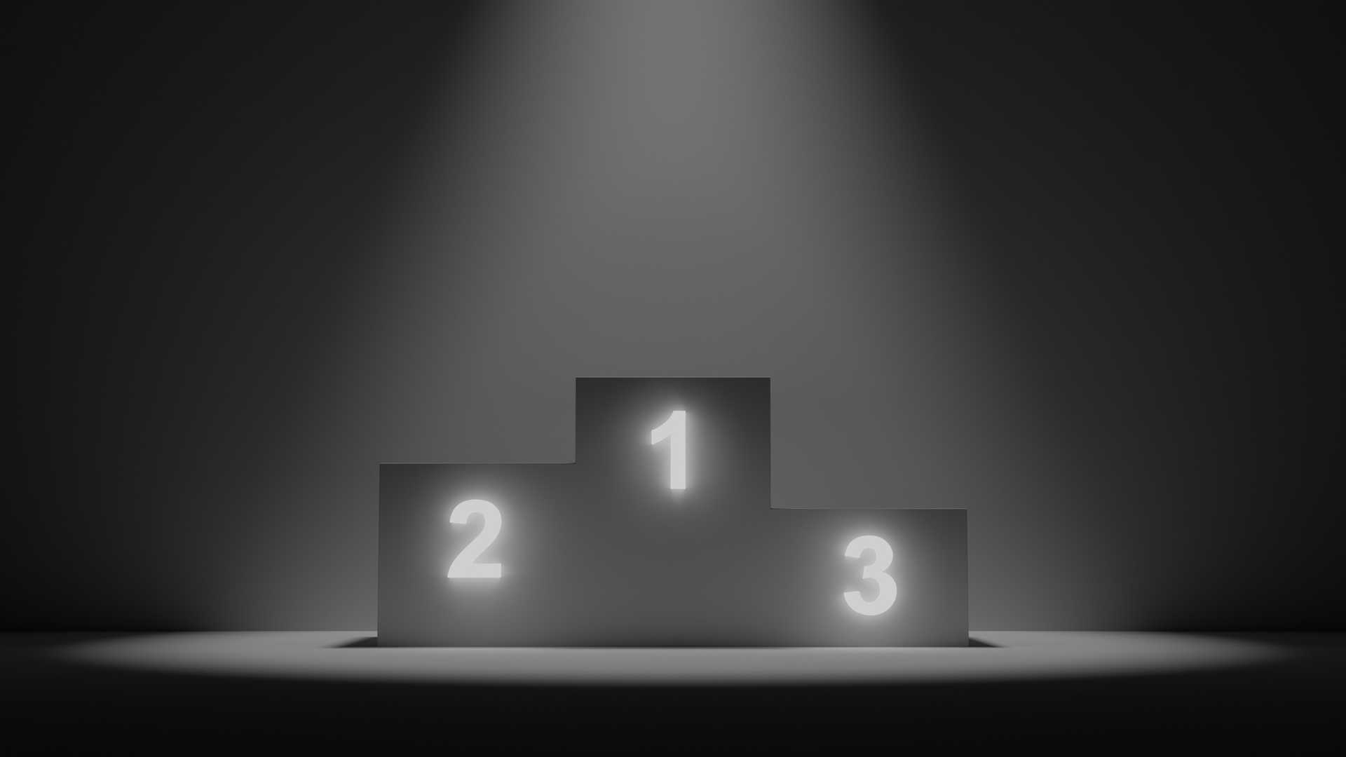 A podium with empty steps from left to right labeled 2, 1 and 3. The 1st place is highest and the 3rd place is lowest.